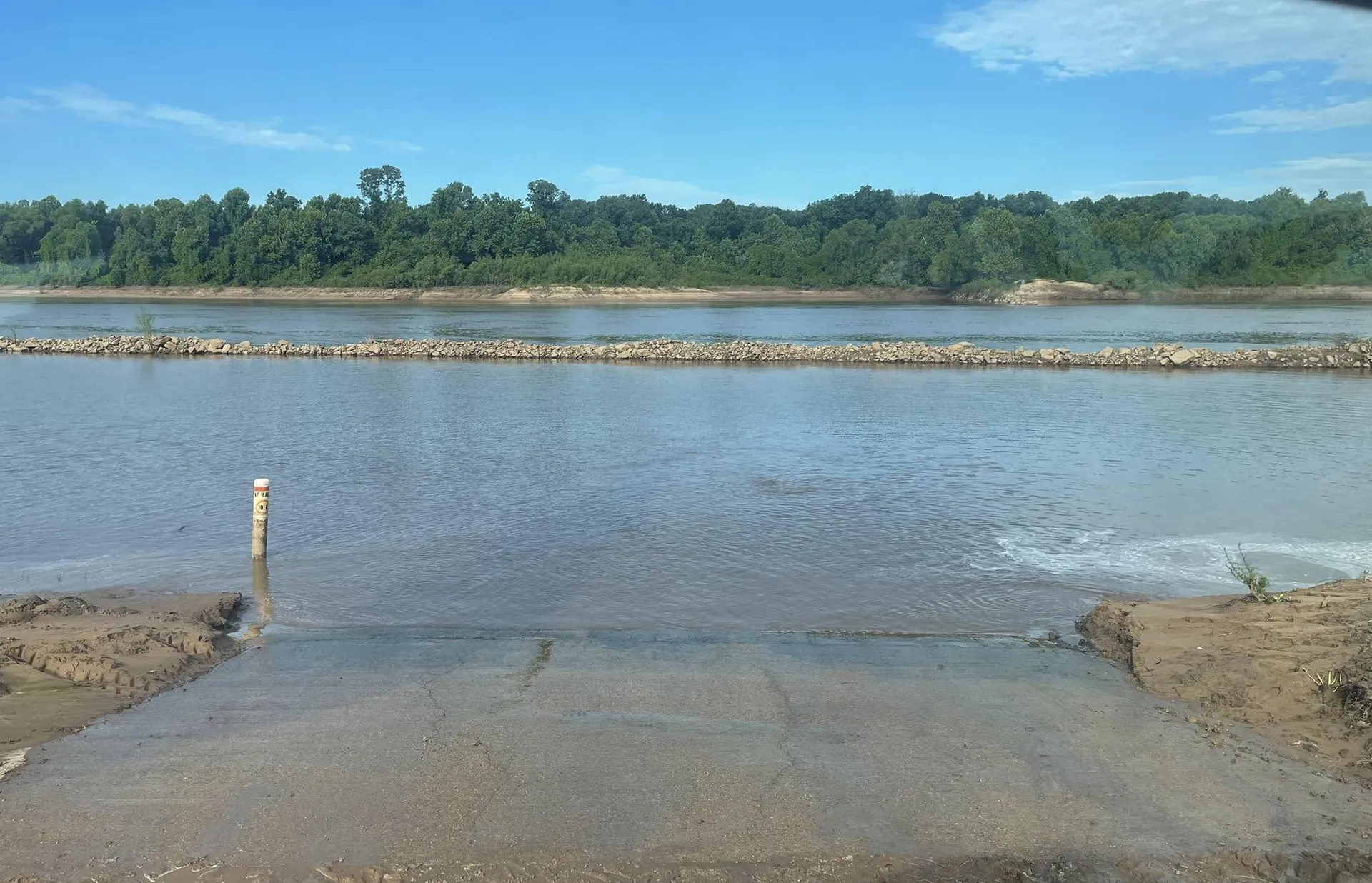 Concrete boat ramp leading into the Red River at River Island RV Park