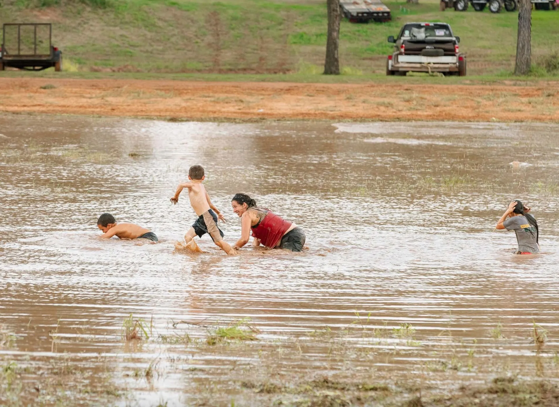 Kids playing in the mud at River Island RV Park